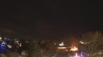 Weather camera view of Sibley East Middle and High School.