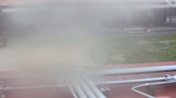 Weather camera view of John Muir Middle School.