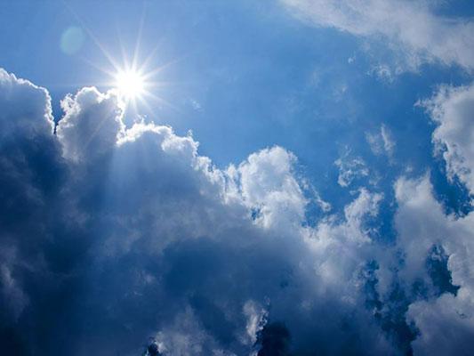 The sun is seen during the middle of the day emerging from clouds. (Courtesy of Pixabay.com)