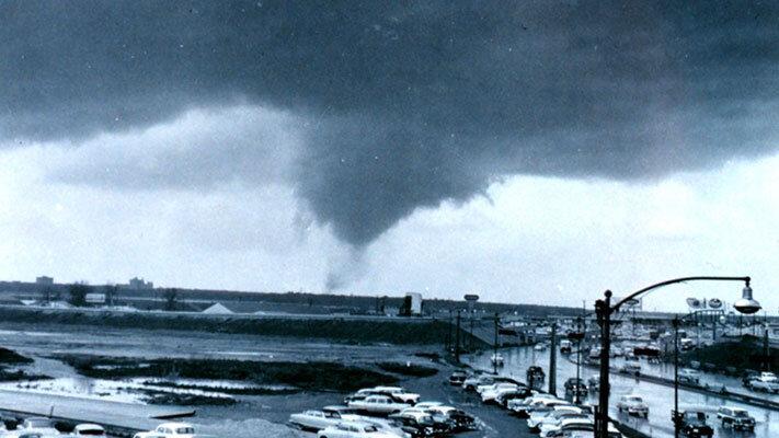 A tornado moves through Dallas on April 2, 1957 (NOAA Photo Library/SELS Weather Bureau).