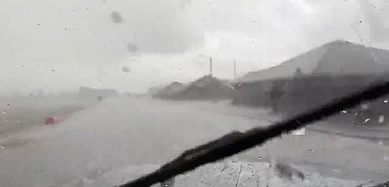 Hail pelting a windshield in Lubbock, Texas.