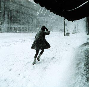 A woman fights her way through a blizzard in New York City.
