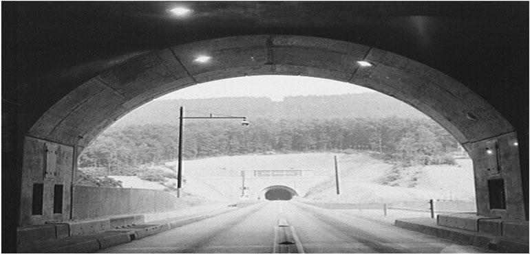 The Blue Mountain Tunnel on the Pennsylvania Turnpike viewed from the Kittatinny Mountain Tunnel. Taken by an employee of the Office of War Information in July 1942. (Library of Congress/Wikimedia Commons)