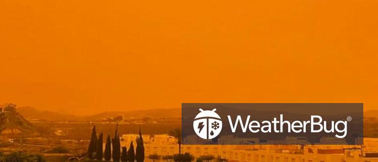 An orange sky is seen in southern Spain on March 15, 2022. (Courtesy of @_Lu_jpg via Storyful)