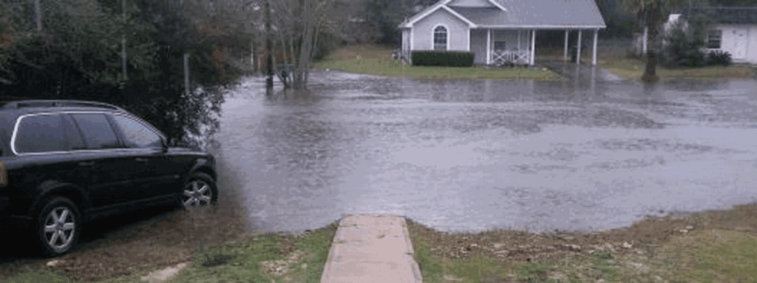 Heavy rain produces flooding on Sunset Boulevard in Fort Walton Beach, Fla., in early February 2016.