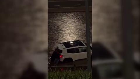 Multiple Cars Stuck in Highway Floodwaters