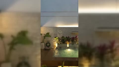 Violent Hail Splashes Down Into Pool During Storm